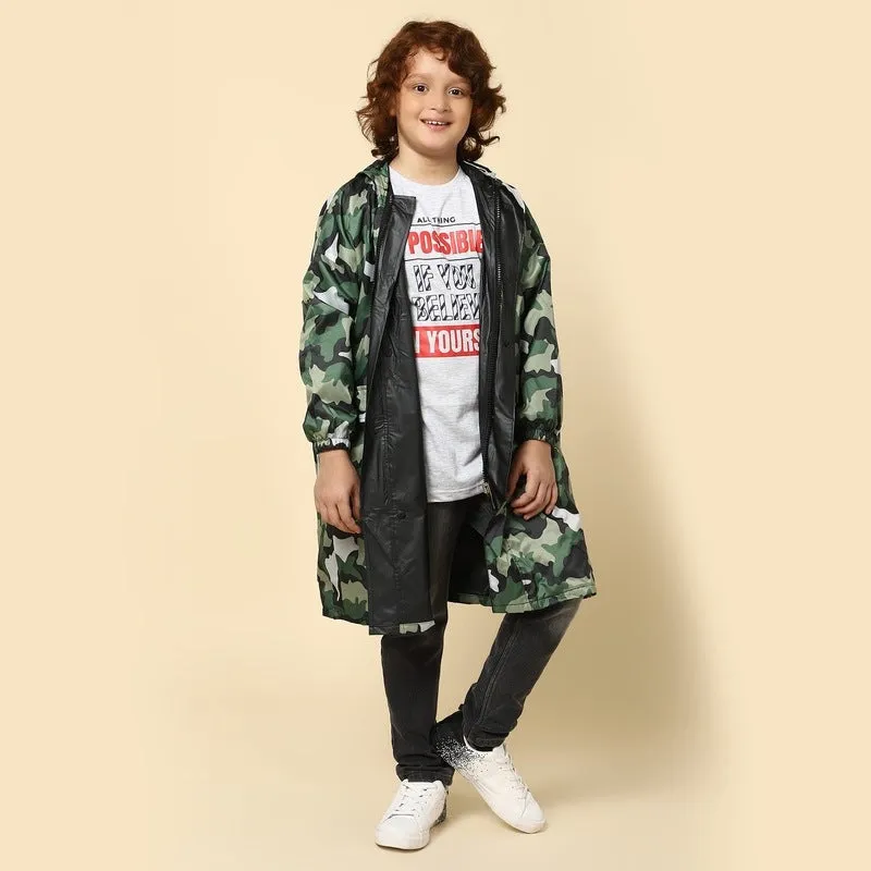 THE CLOWNFISH Archie Series Kids Waterproof PVC Longcoat with Adjustable Hood & Extra Space for Backpack/Schoolbag Holding. Plastic Pouch. Kid Age-6-7 years (Size-30-Green)